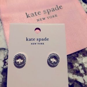 Kate Spade “Spot the Spade” stud earrings.